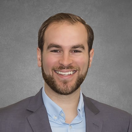 Portrait of COO Brian Wilkey in a business suit